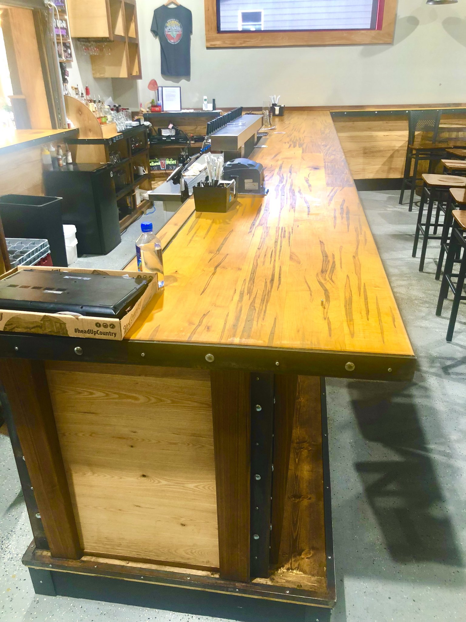 Ambrosia maple and ash bar with walnut corbels and hand-fabricated steel trim accents