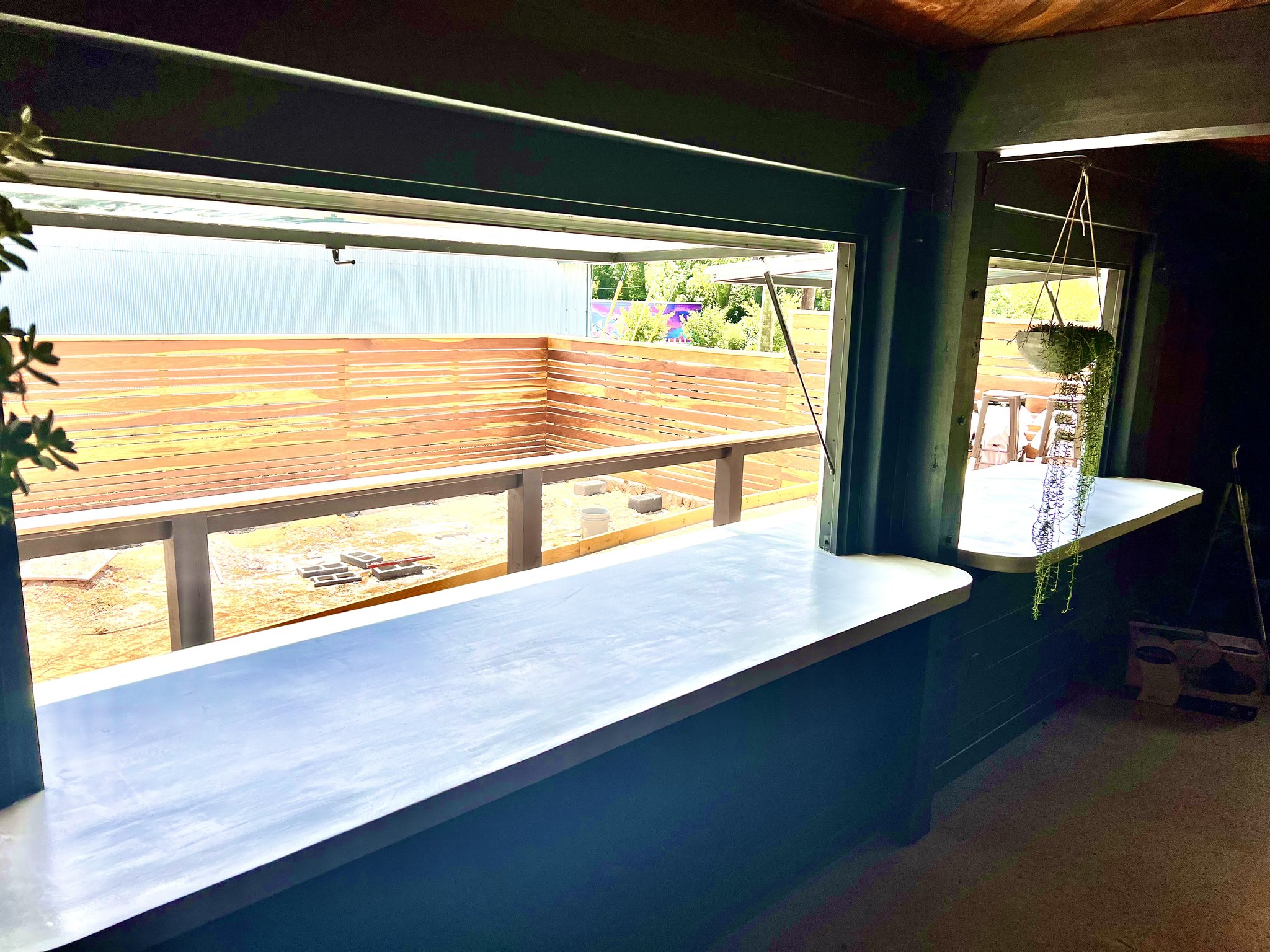 Commercial pass-through counter and bar build at Anoche with epoxy countertop