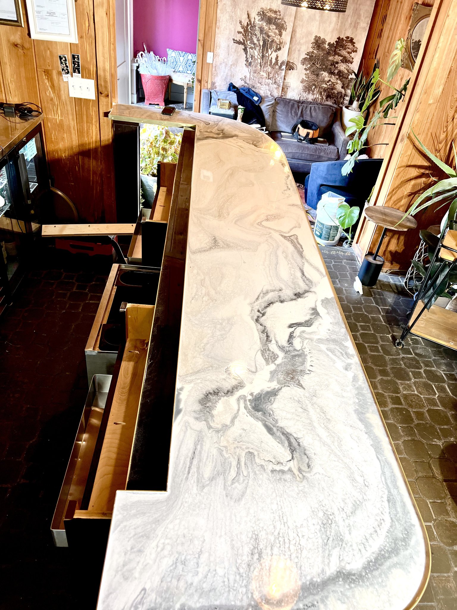 Dirty pour marble epoxy bar top detail at Haiku I Do