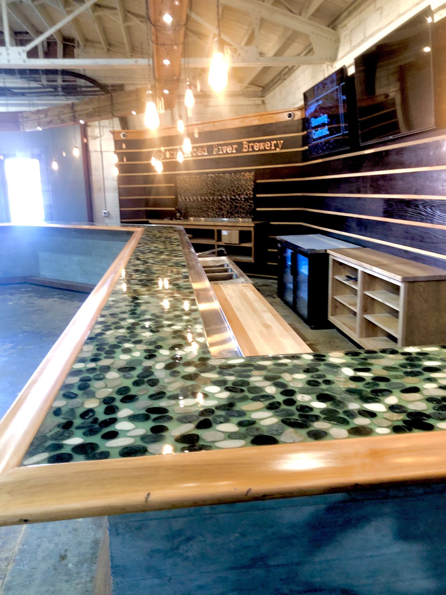 Overhead view of river stone bar top