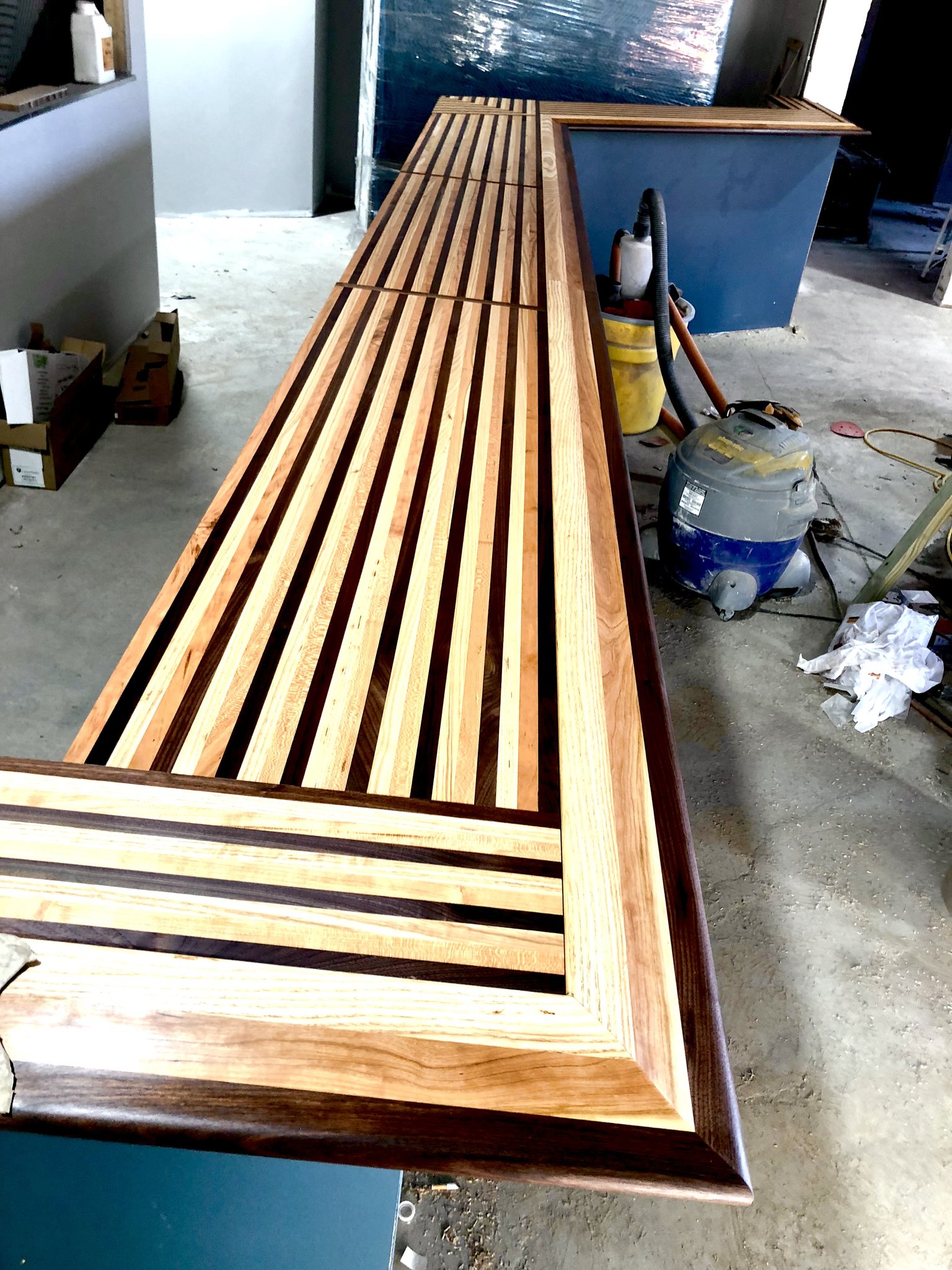 Three-species butcher block bar top — walnut, maple, and cherry — at The Whale, West Asheville