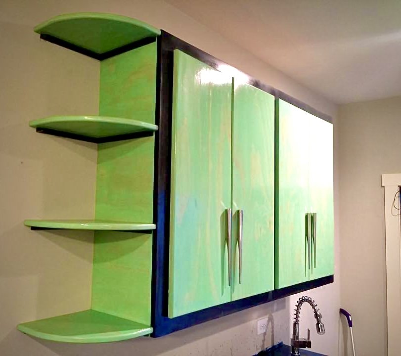 Custom upper cabinets with corner shelves in marine gloss finish