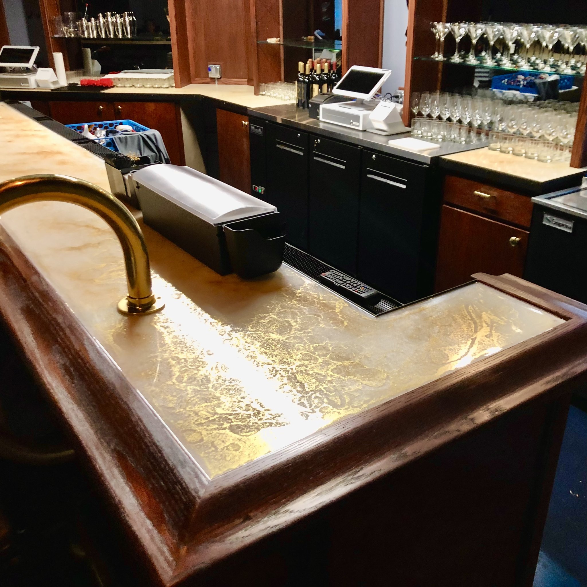 Epoxy pearl and gold bar countertop with glowing gold finish at Room to Dance