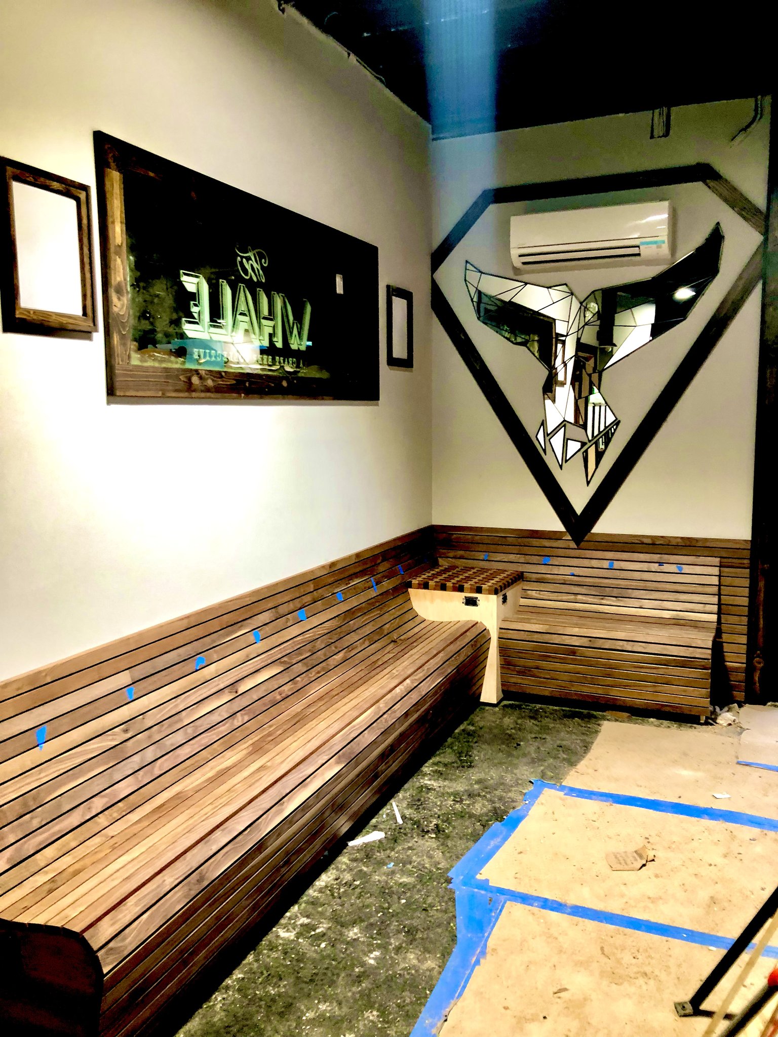 Walnut slat bench seating at The Whale